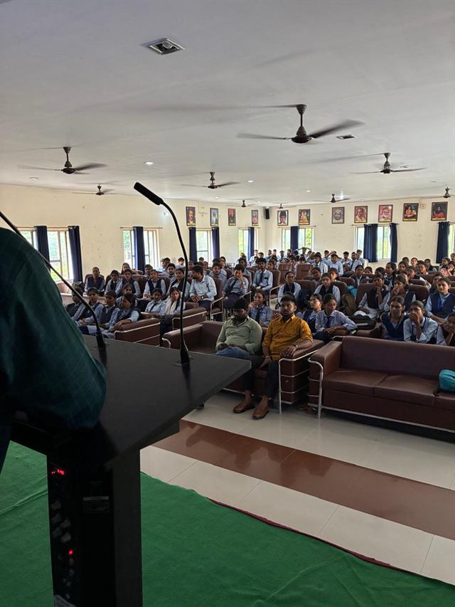 A full seminar hall seen from the stage