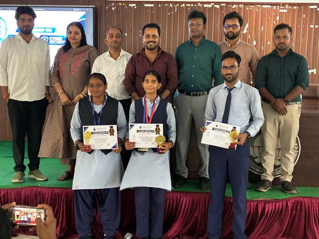 The top three rankers holding trophies and ranker certificates